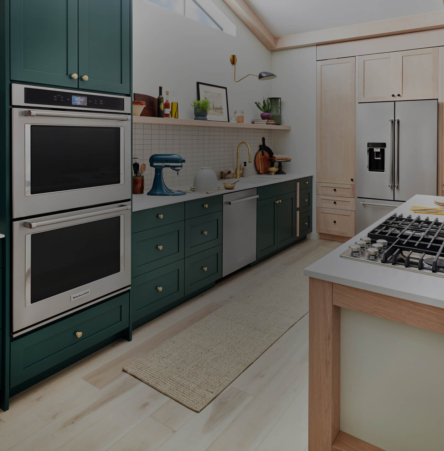 A contemporary kitchen featuring KitchenAid® appliances.