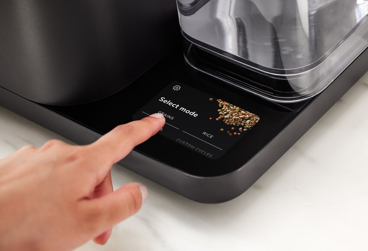 A person interacting with the intuitive controls, selecting a grain preset.