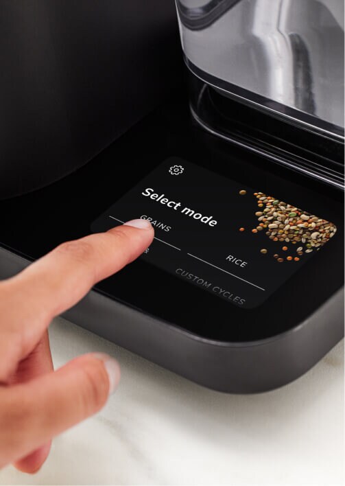 Espresso glass and carafe of milk