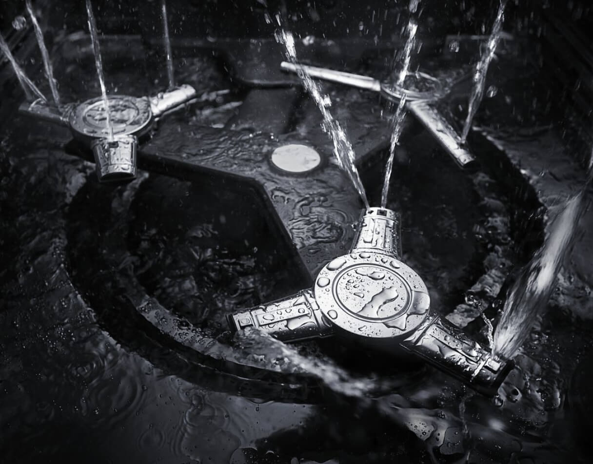 Spray jets spray water inside a KitchenAid Dishwasher