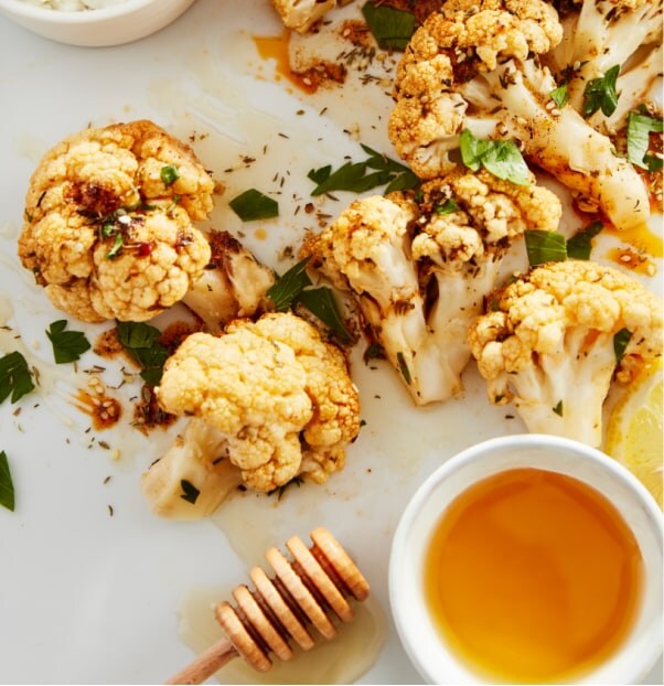 Cauliflower drizzled in golden honey.