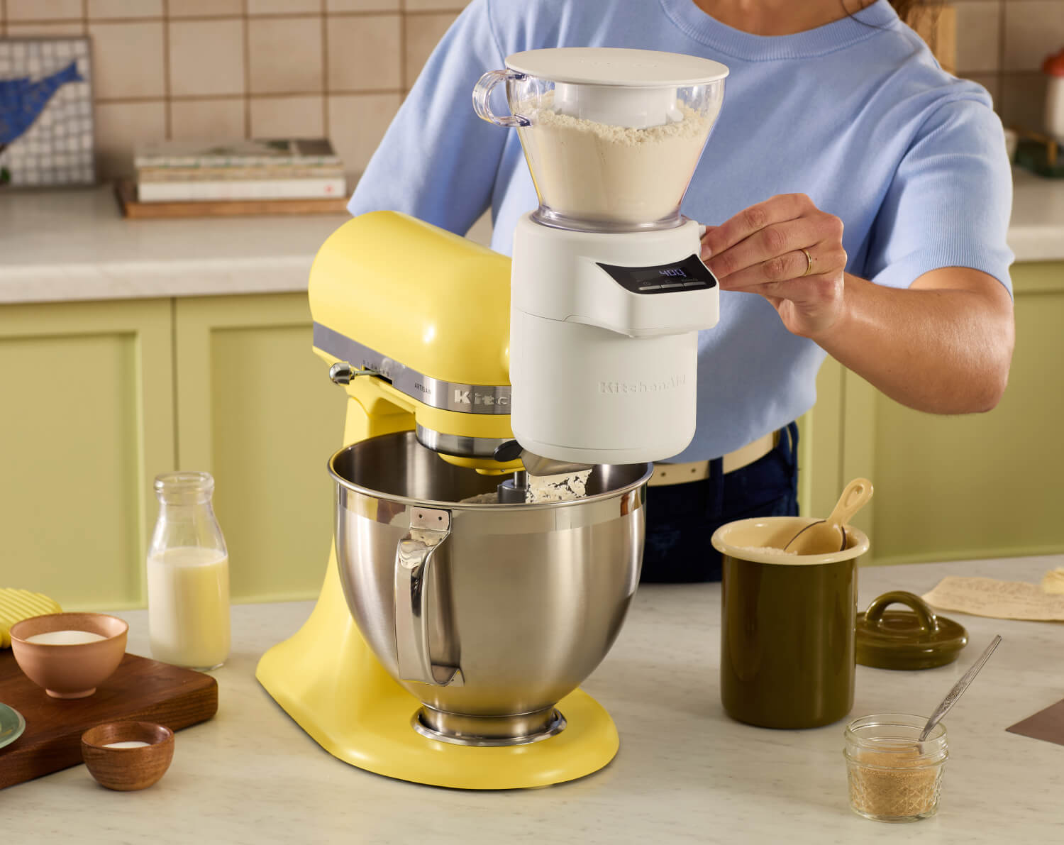 A person using the Butter Stand Mixer.