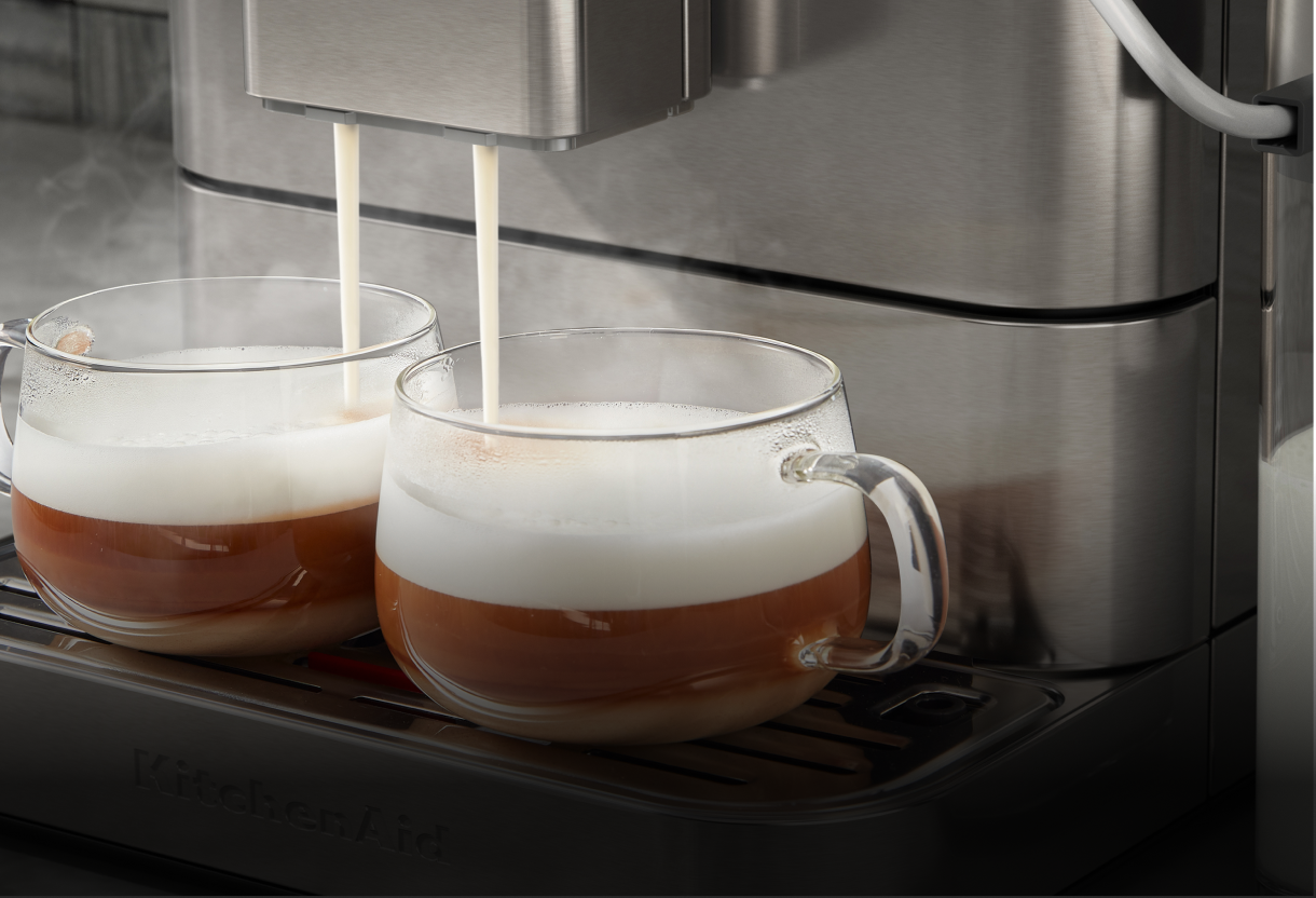 Espresso machine making two espresso drinks