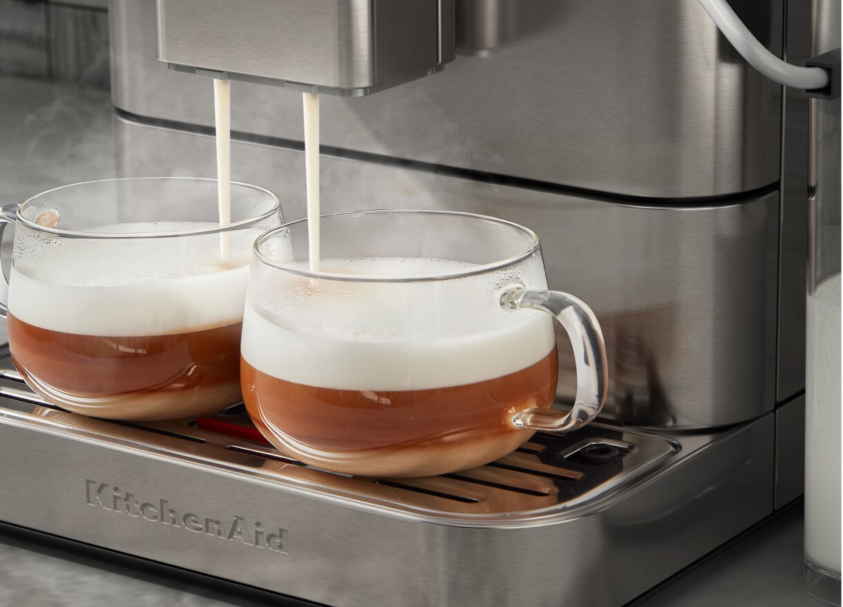 Espresso machine making two espresso drinks