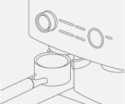 An infographic depicting a portafilter being inserted into the portafilter holder