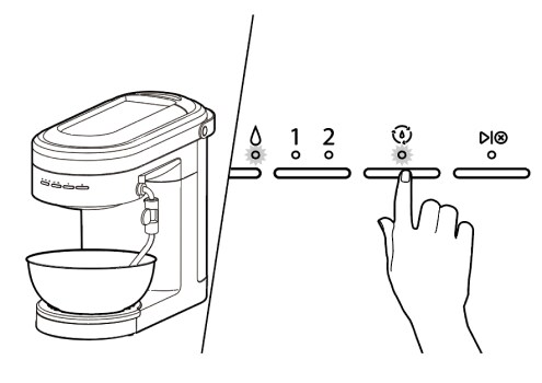 Espresso machine with bowl under group head, finger pressing clean cycle button