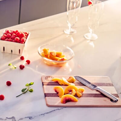 Peach slices on a cutting board