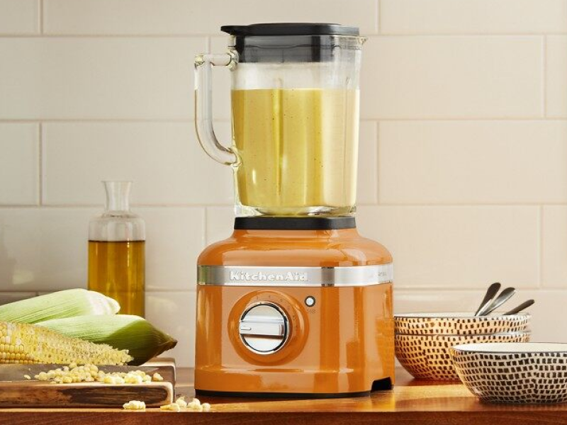 Food blending in an orange KitchenAid® blender