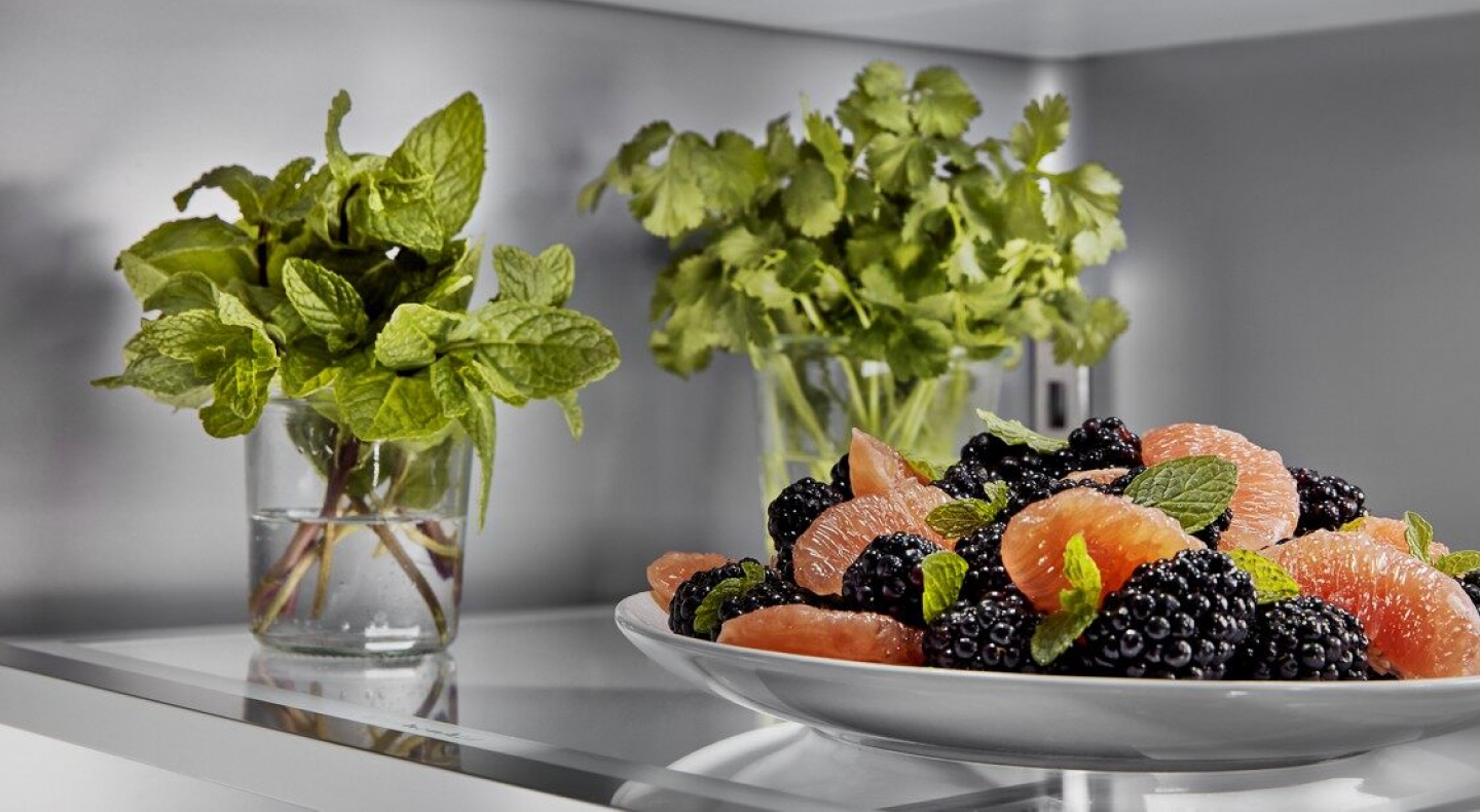 Fruit salad garnished with fresh mint