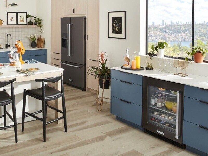 Person eating inside a contemporary kitchen