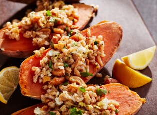 A bowl of steamed broccoli and cauliflower florets.