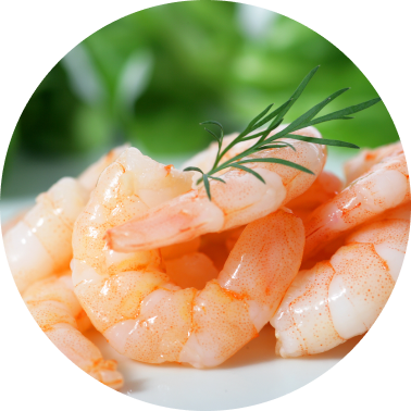 A small pile of raw shrimp, peeled and deveined.