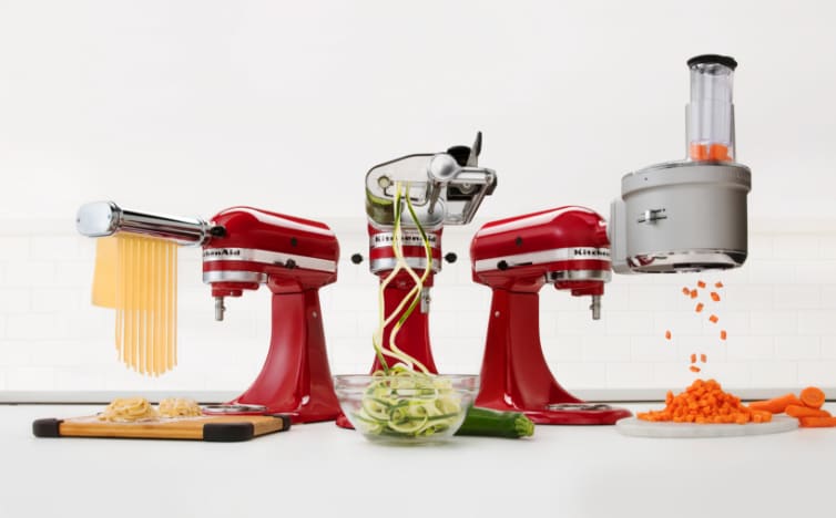 Group of 3 KitchenAid stand mixers with pasta attachment spiralizer attachment and food processor attachment