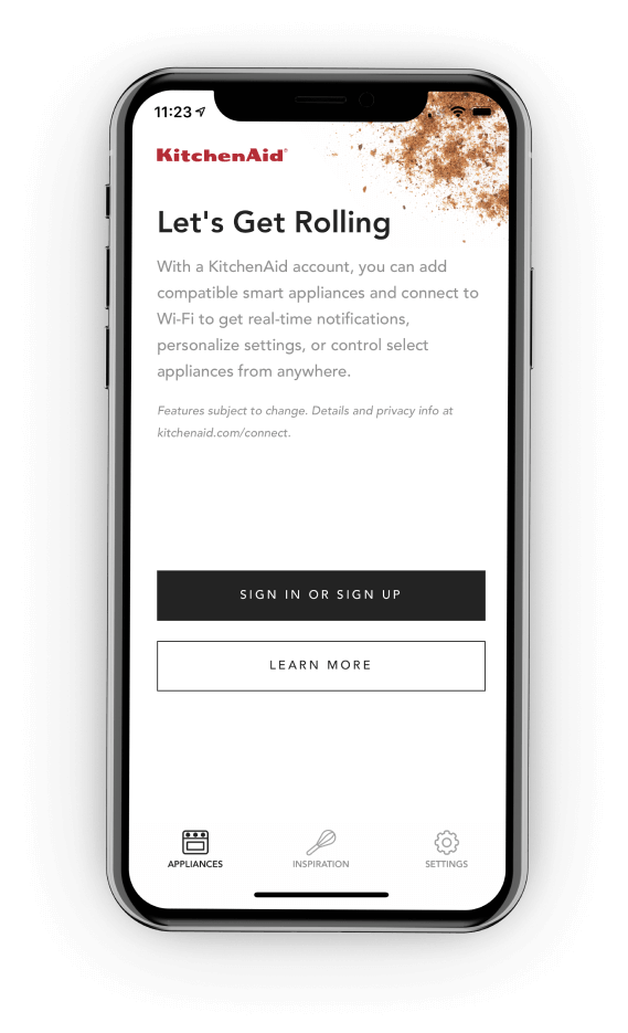 A smartphone displaying the sign up screen of the KitchenAid™ app.
