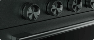 A close-up on the handle and knobs of a Juniper range.