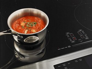 Pasta sauce cooking on an induction cooktop